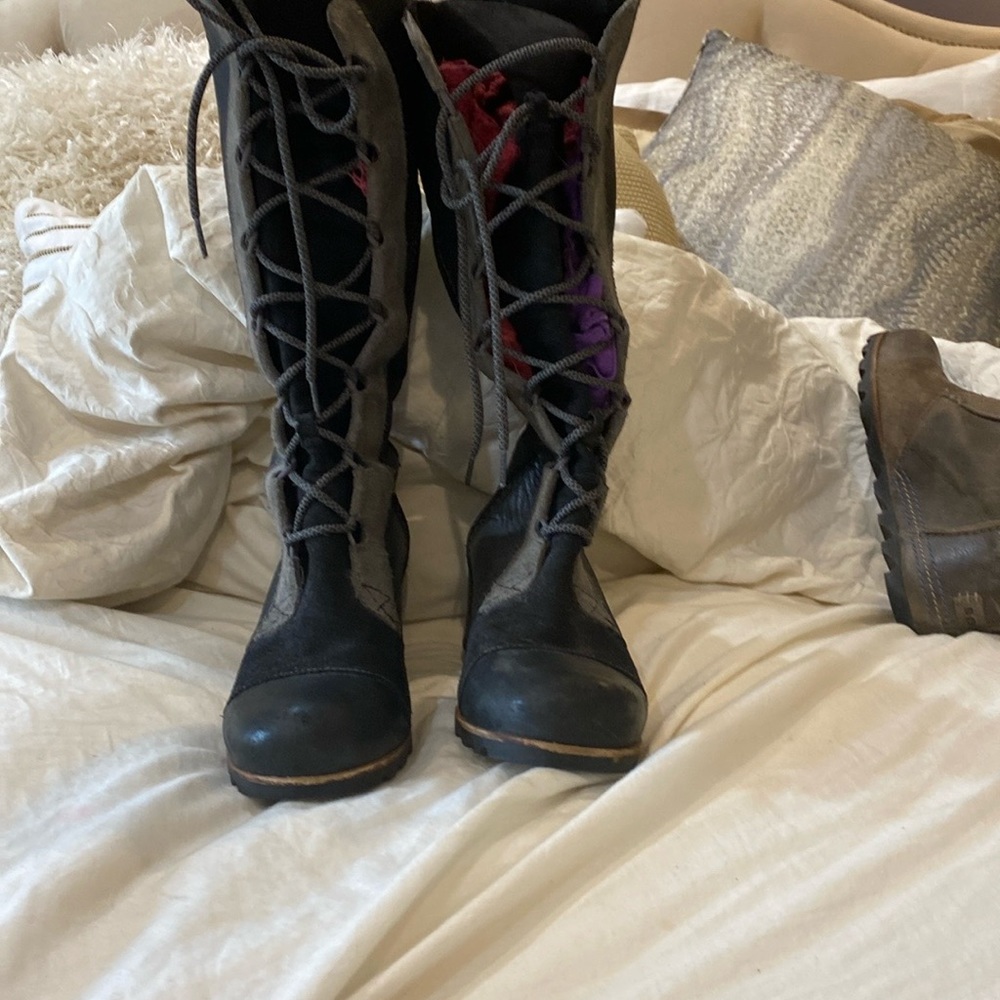 Sorel lace up high boots.